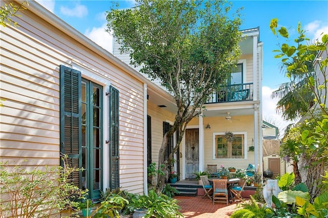 3342 Bell St, New Orleans, LA 70119 - rear view of house featuring a balcony
