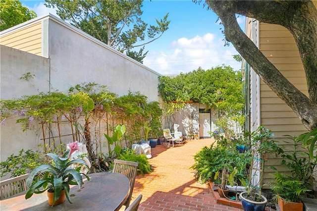 3342 Bell St, New Orleans, LA 70119 - view of patio / terrace with fence and outdoor dining space