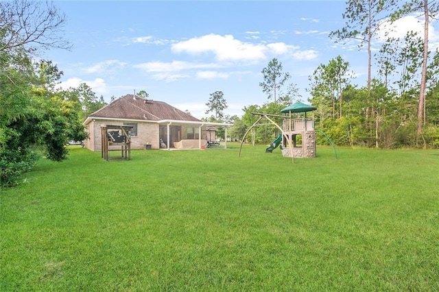 view of yard with a playground