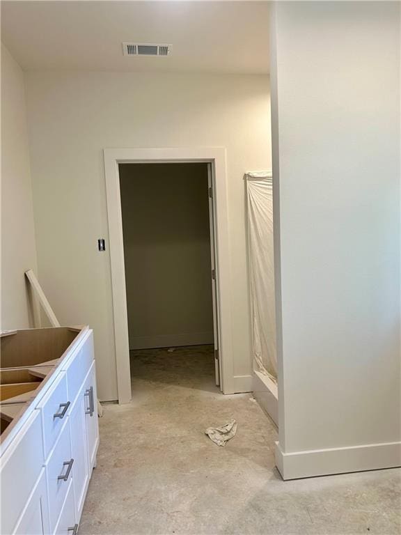 75396 Henderson Rd, Covington, LA 70435 - bathroom featuring a shower with shower curtain, unfinished concrete floors, and baseboards