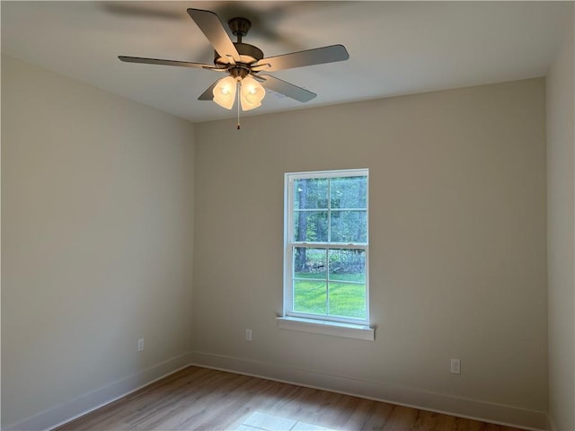 75396 Henderson Rd, Covington, LA 70435 - unfurnished room with light wood-style floors and a ceiling fan