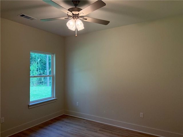 75396 Henderson Rd, Covington, LA 70435 - unfurnished room with wood finished floors and a ceiling fan