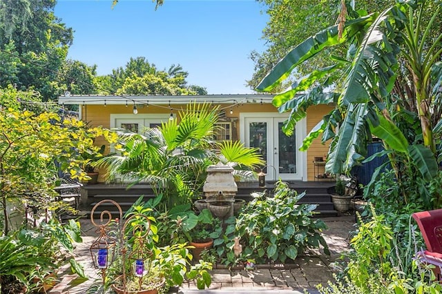1838 Burgundy St, New Orleans, LA 70116 - view of front of home featuring french doors