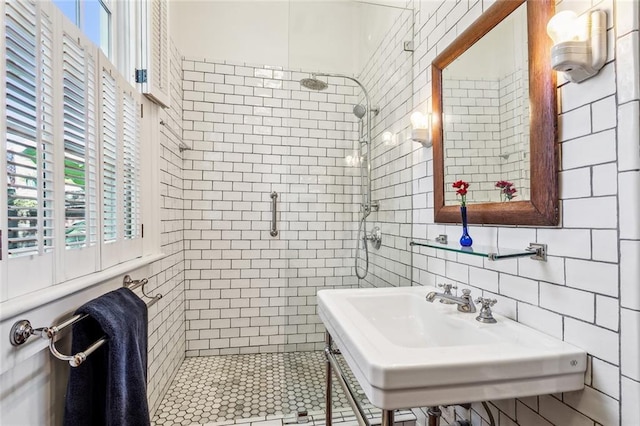 1838 Burgundy St, New Orleans, LA 70116 - full bath with a stall shower, a wealth of natural light, and tile walls