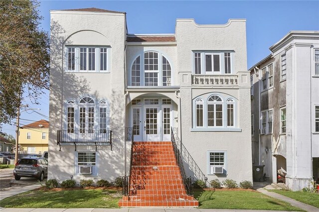 4237 Fontainebleau Dr, New Orleans, LA 70125 - unfurnished sunroom with french doors