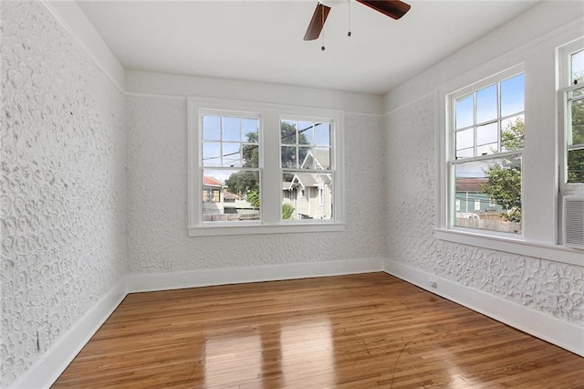 4237 Fontainebleau Dr, New Orleans, LA 70125 - unfurnished room with wood finished floors and a ceiling fan