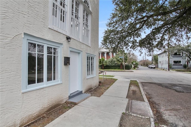4237 Fontainebleau Dr, New Orleans, LA 70125 - view of home's exterior featuring stucco siding