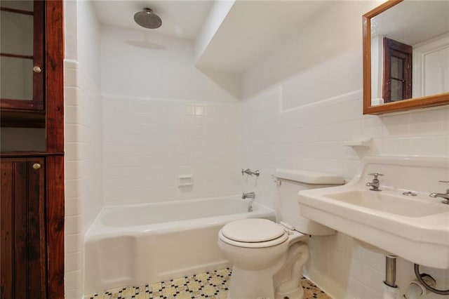 4237 Fontainebleau Dr, New Orleans, LA 70125 - bathroom featuring a tub, tile walls, and a shower