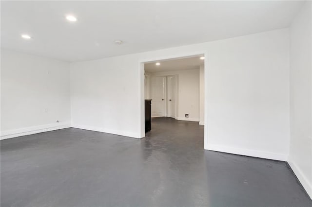 4237 Fontainebleau Dr, New Orleans, LA 70125 - spare room with finished concrete flooring and recessed lighting