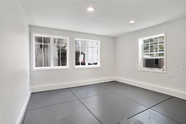 4237 Fontainebleau Dr, New Orleans, LA 70125 - empty room featuring cooling unit and recessed lighting