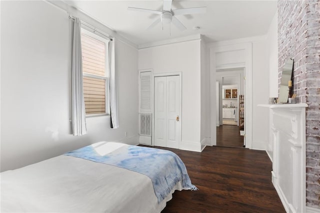 274446 Dumaine St, New Orleans, LA 70119 - bedroom featuring baseboards, a closet, wood finished floors, and a ceiling fan