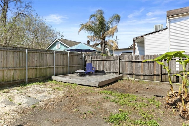 274446 Dumaine St, New Orleans, LA 70119 - view of yard with a fenced backyard and a wooden deck