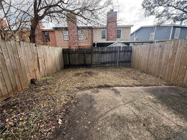 view of yard featuring a fenced backyard