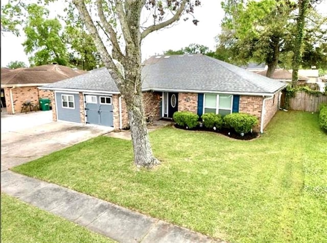 2516 E Pearl Dr, Marrero, LA 70072 - single story home with brick siding, concrete driveway, and roof with shingles