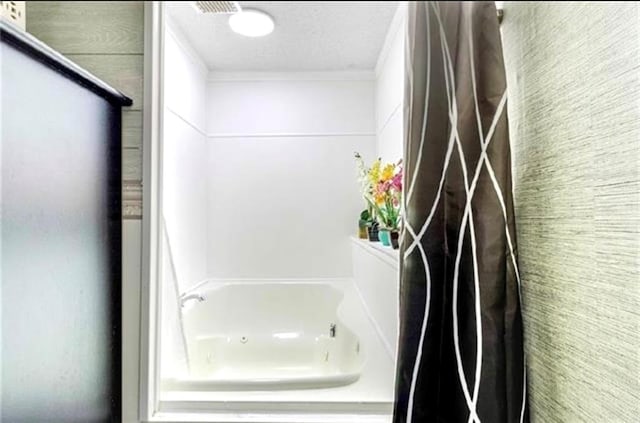 2516 E Pearl Dr, Marrero, LA 70072 - full bathroom featuring crown molding, a tub, and a shower
