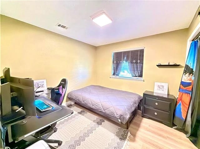 2516 E Pearl Dr, Marrero, LA 70072 - bedroom featuring wood finished floors and an office area
