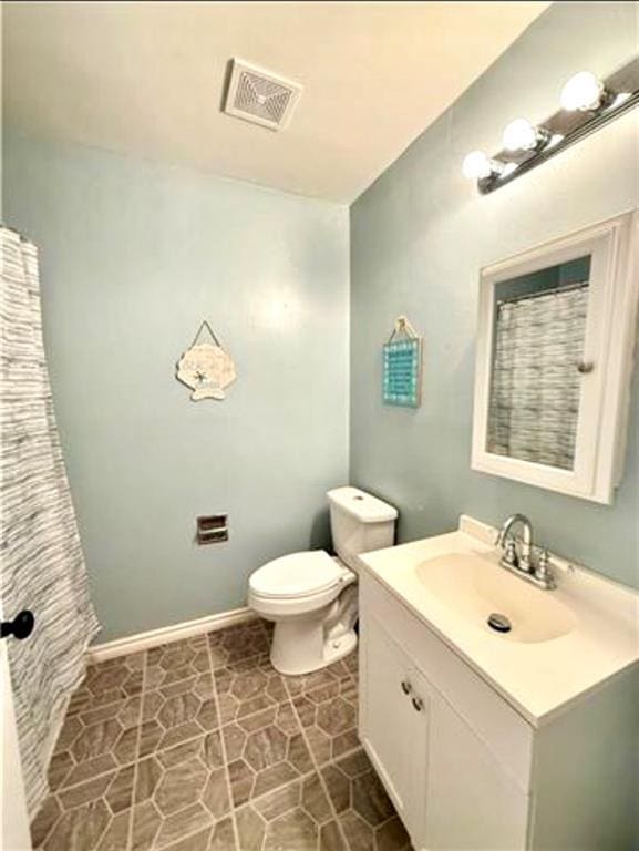2516 E Pearl Dr, Marrero, LA 70072 - bathroom featuring vanity and toilet