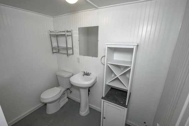3611 Elaine Pl, New Orleans, LA 70119 - bathroom with baseboards, concrete flooring, and toilet