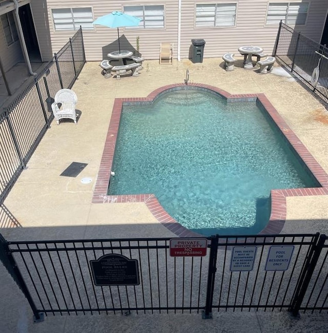 4518 Y A Tittle Ave Unit 6, Baton Rouge, LA 70820 - pool featuring fence and a patio