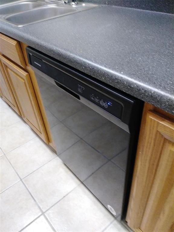4518 Y A Tittle Ave Unit 6, Baton Rouge, LA 70820 - interior details featuring a sink, dark countertops, and black dishwasher
