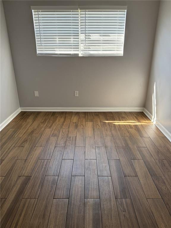 4518 Y A Tittle Ave Unit 6, Baton Rouge, LA 70820 - spare room featuring dark wood finished floors and baseboards
