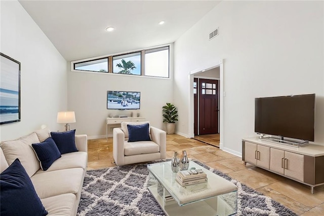 4741 Lafon Dr, New Orleans, LA 70126 - living room featuring baseboards, high vaulted ceiling, visible vents, and recessed lighting