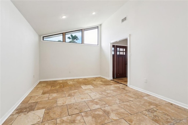 4741 Lafon Dr, New Orleans, LA 70126 - empty room with baseboards, lofted ceiling, visible vents, and recessed lighting