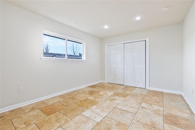 4741 Lafon Dr, New Orleans, LA 70126 - unfurnished bedroom with baseboards, a closet, and recessed lighting