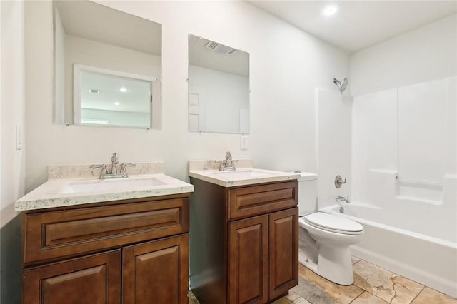 4741 Lafon Dr, New Orleans, LA 70126 - full bath with visible vents, toilet, a sink, and two vanities
