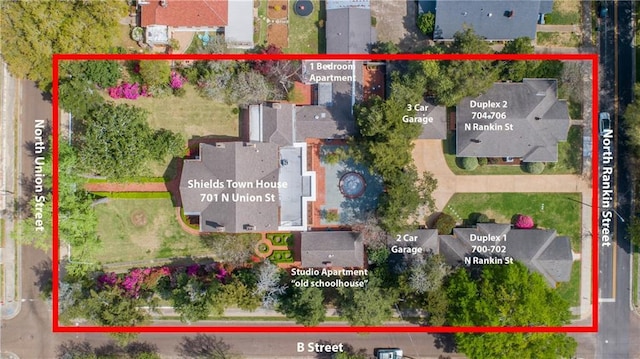 birds eye view of property with a residential view