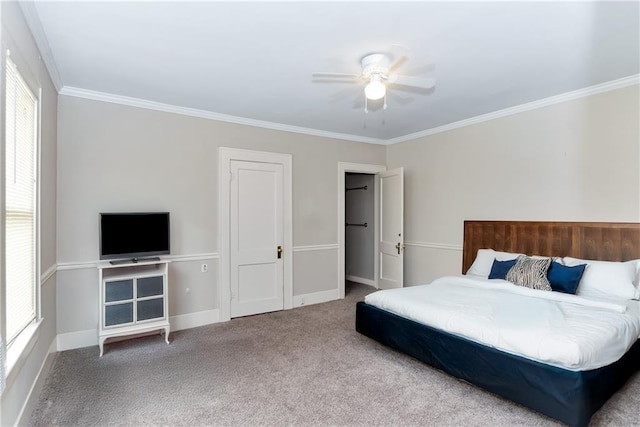bedroom featuring carpet, crown molding, baseboards, and a ceiling fan