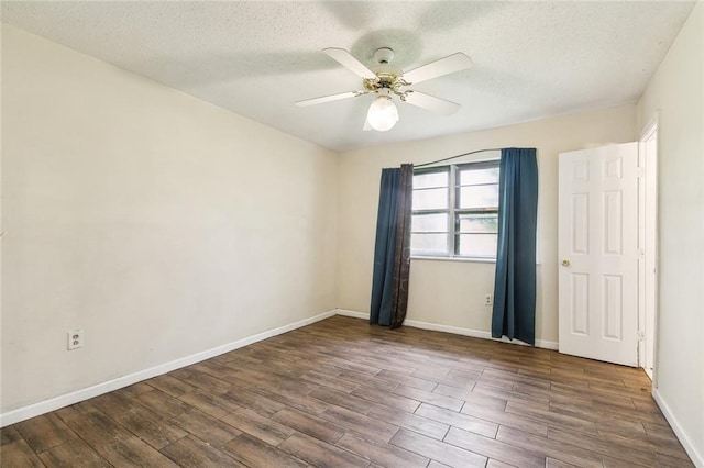 9180 Dancy Ave, Baton Rouge, LA 70814 - unfurnished room with baseboards, a textured ceiling, wood finished floors, and a ceiling fan