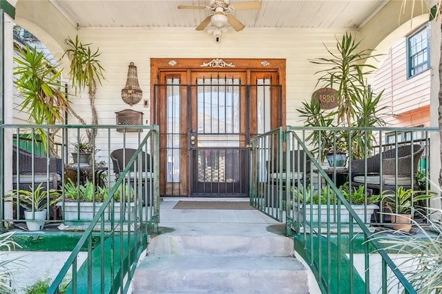 1830 Burgundy St, New Orleans, LA 70116 - doorway to property featuring ceiling fan and a porch