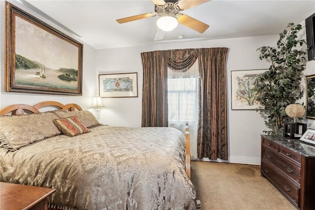 1830 Burgundy St, New Orleans, LA 70116 - bedroom featuring light carpet and a ceiling fan