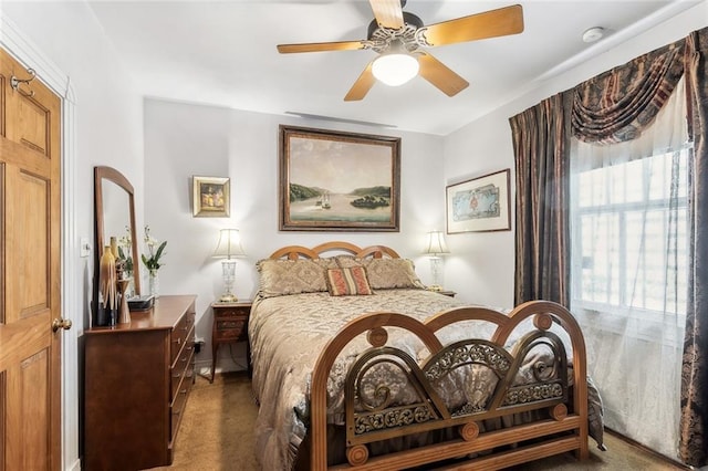 1830 Burgundy St, New Orleans, LA 70116 - carpeted bedroom featuring a ceiling fan