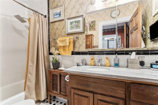 1830 Burgundy St, New Orleans, LA 70116 - bathroom featuring vanity, shower / bath combo, and wallpapered walls