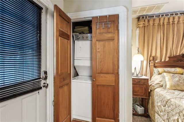 1830 Burgundy St, New Orleans, LA 70116 - laundry area with estacked washer and dryer