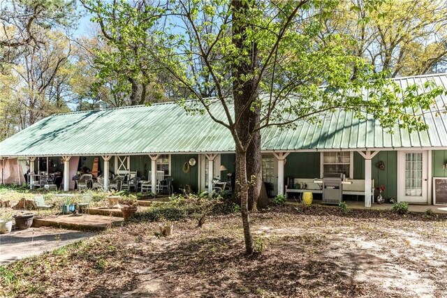 view of front of house with metal roof