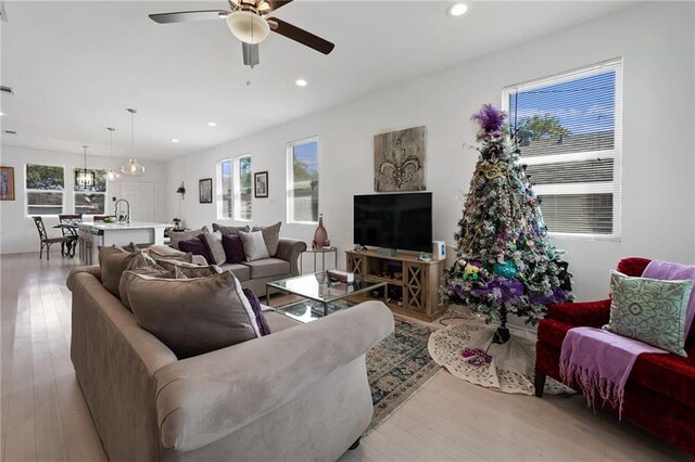 4409 Jeanne Marie Pl, New Orleans, LA 70122 - living room featuring recessed lighting, a ceiling fan, and light wood finished floors