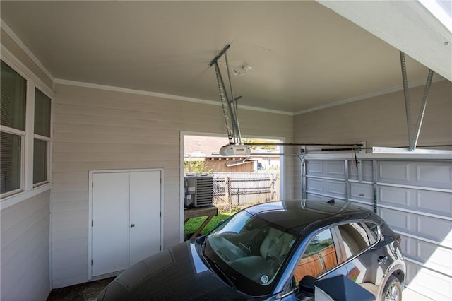 4409 Jeanne Marie Pl, New Orleans, LA 70122 - garage featuring central air condition unit and fence