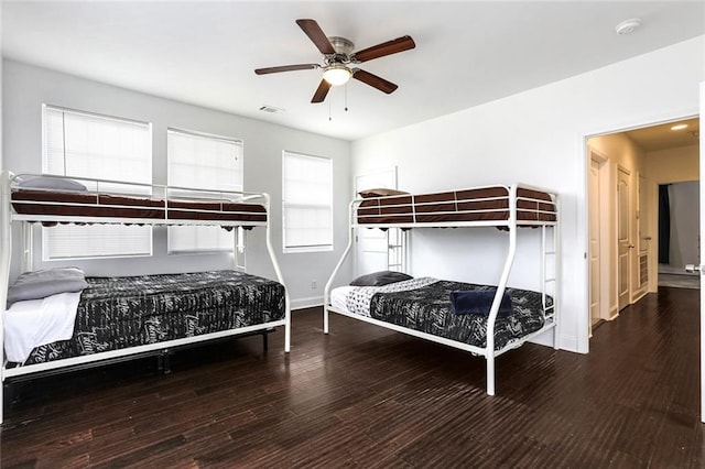 3415 Louisiana Ave Parkway, New Orleans, LA 70125 - bedroom featuring baseboards, visible vents, ceiling fan, and wood finished floors
