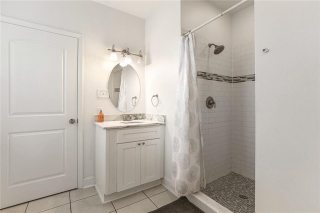3415 Louisiana Ave Parkway, New Orleans, LA 70125 - bathroom featuring tile patterned floors, vanity, and a stall shower