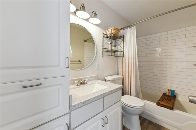 4719 Annunciation St Unit 4719, New Orleans, LA 70115 - bathroom featuring vanity, toilet, shower / bath combination with curtain, and wood finished floors
