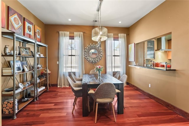 5533 Woodlawn Pl, New Orleans, LA 70124 - dining space featuring plenty of natural light, baseboards, wood finished floors, and recessed lighting