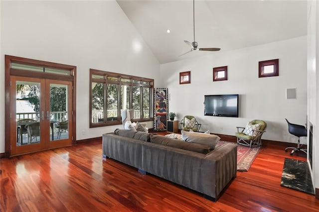 5533 Woodlawn Pl, New Orleans, LA 70124 - living room with high vaulted ceiling, wood finished floors, french doors, a ceiling fan, and plenty of natural light