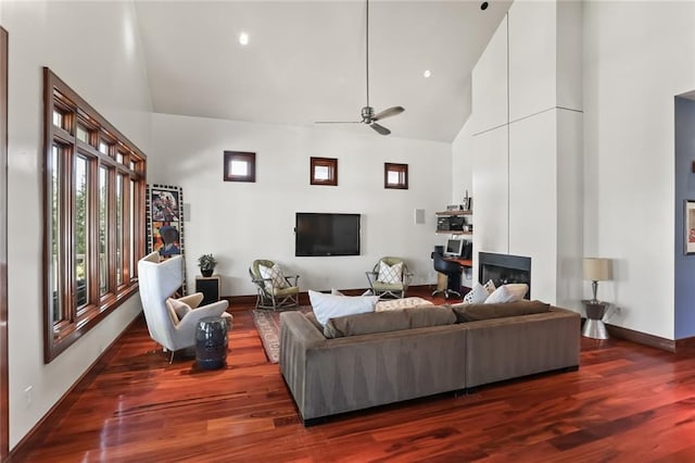 5533 Woodlawn Pl, New Orleans, LA 70124 - living room with high vaulted ceiling, wood finished floors, ceiling fan, and baseboards