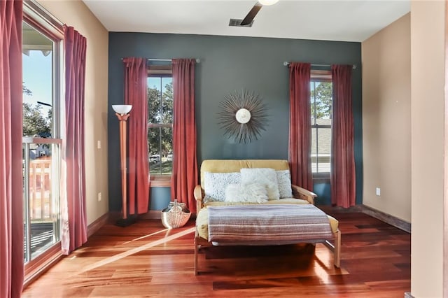 5533 Woodlawn Pl, New Orleans, LA 70124 - living area featuring wood finished floors and baseboards