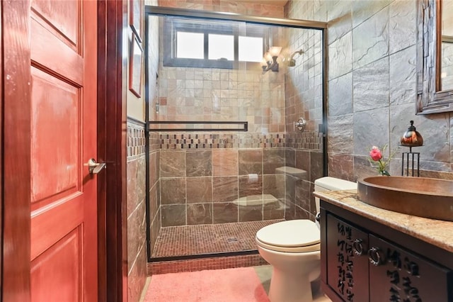 5533 Woodlawn Pl, New Orleans, LA 70124 - full bath with a stall shower, toilet, tile walls, and vanity