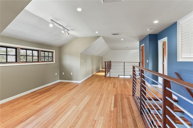5533 Woodlawn Pl, New Orleans, LA 70124 - bonus room featuring baseboards, light wood-type flooring, vaulted ceiling, and recessed lighting