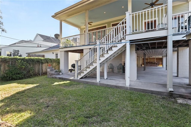 5533 Woodlawn Pl, New Orleans, LA 70124 - rear view of property with ceiling fan, a patio, and stairs